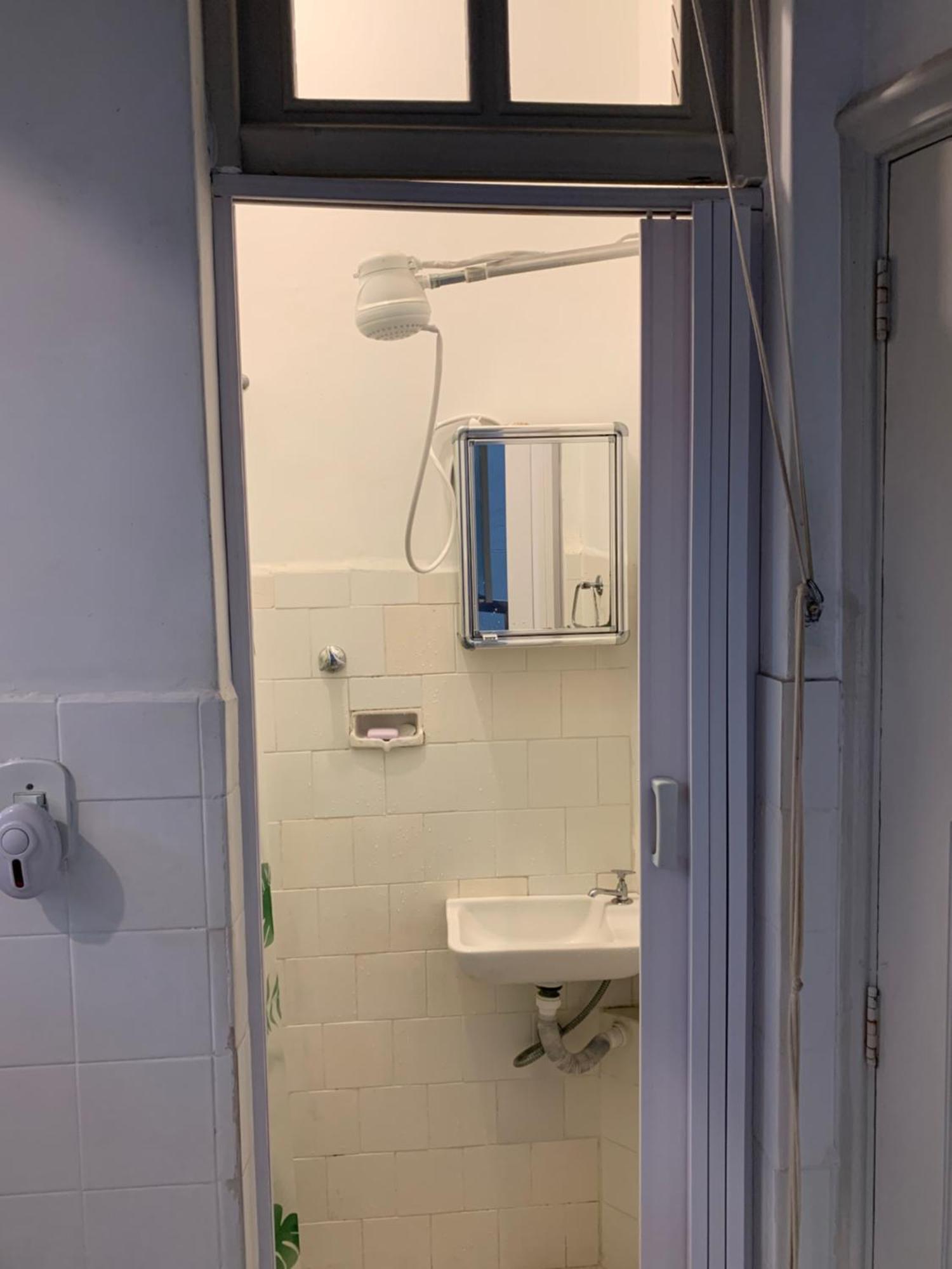 Single Room Shared Shower Toilet